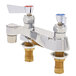 A Fisher deck mounted faucet with two lever handles.