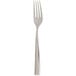 An Arcoroc stainless steel dinner fork with a silver handle.