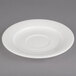 A white Villeroy & Boch porcelain saucer on a gray surface.