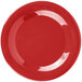 a red plate with a white background