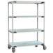 A white MetroMax cart with three metal shelves on wheels.