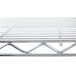 A close-up of a Metro Erecta chrome wire shelf.