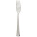 An Arcoroc stainless steel dinner fork with a silver handle.