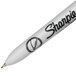 A close-up of a black Sharpie Ultra-Fine Point Retractable Permanent Marker.