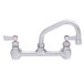 A clear Fisher wall mount faucet with two lever handles.