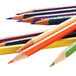 A group of Prismacolor colored pencils with different colors on a white background.