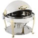 A Bon Chef stainless steel chafer with brass accents on a counter.