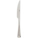 An Arcoroc Mikayla stainless steel dinner knife with a solid silver handle.