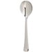 An Arcoroc stainless steel soup spoon with a handle.