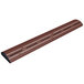 An antique copper metal beam with holes.