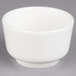 A white Villeroy & Boch porcelain bowl on a gray surface.