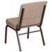 A beige Flash Furniture church chair with a copper vein metal frame.