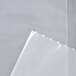 A white plastic LK Packaging food bag on a surface.