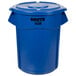 A blue plastic Rubbermaid BRUTE trash can with lid.