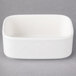 A white rectangular Villeroy & Boch porcelain sugar packet holder.