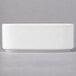 A white rectangular porcelain sugar packet holder with a diamond pattern on the lid.