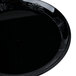 A black WNA Comet plastic plate with a decorative design.