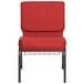 A Flash Furniture red church chair with metal legs.