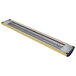 A long metal Hatco curved infrared food warmer with a red stripe.