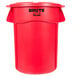 A red Rubbermaid Brute round trash can with lid.