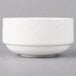 A close-up of a white Villeroy & Boch Bella porcelain soup cup with a diamond pattern.