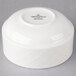A white Villeroy & Boch porcelain soup cup with black text.