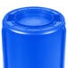 A blue Rubbermaid BRUTE plastic barrel with a lid.