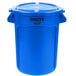 A blue Rubbermaid BRUTE round plastic trash can with lid.