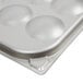 A silver Vollrath Egg Poacher Pan with six cups.