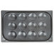 A black Vollrath Egg Poacher pan with six round holes.