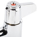 A chrome Equip by T&S deck-mounted faucet with lever handles and a gooseneck spout.