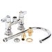 A chrome Equip by T&S deck-mounted faucet with gooseneck spout and lever handles.