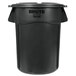 A black Rubbermaid BRUTE round plastic trash can with lid.