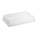 A clear plastic high dome lid over a white object.