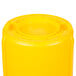 A yellow plastic container with a lid.