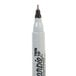 A white Sharpie container with black writing and a black tip.