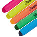 A close-up of a Sharpie 5-color gel highlighter with pink and yellow ink.