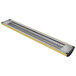 A long metal Hatco curved infrared food warmer with a yellow stripe.