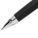 A close up of a black Uni-Ball Signo 207 pen with silver accents.