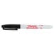 The Sharpie Pro Black Fine Point Industrial Permanent Marker with the red letter S on a white surface.