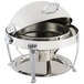 A Bon Chef stainless steel round chafer with chrome accents on a stand with a lid.