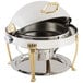 A Bon Chef stainless steel chafer with gold accents.