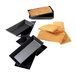 A group of rectangular black Matfer Bourgeat tartlet pans.