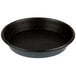 A black round Matfer Bourgeat tart pan with a black rim.