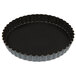 A black Matfer Bourgeat fluted tart pan.