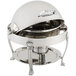 A silver Bon Chef Petite roll top chafer with a lid on a table.