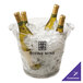 A Franmara clear acrylic wine bucket holding three bottles of wine in ice.