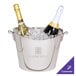 A Franmara Chevalier oval wine/champagne cooler filled with ice and two bottles of champagne.