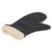 A black oven mitt with a fur lining.