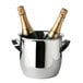 A silver Franmara Triomphe wine cooler with two bottles of champagne inside.